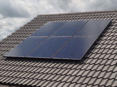 On_roof__Black_250W_PV_Solar_Panel